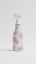 Multi-surface cleaner in pink glass bottle